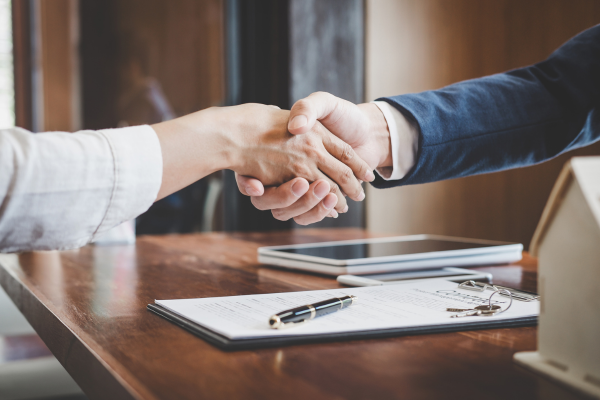 two people shaking hands