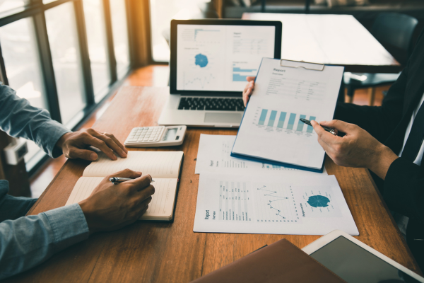 desk with market trend reports